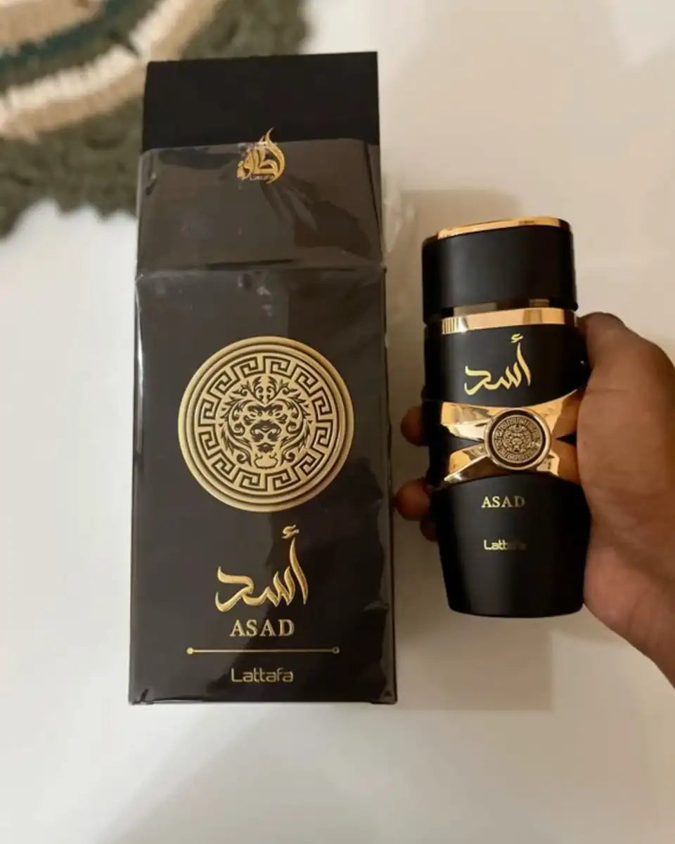 Caja y frasco de Lattafa Asad EDP 100 ml original
